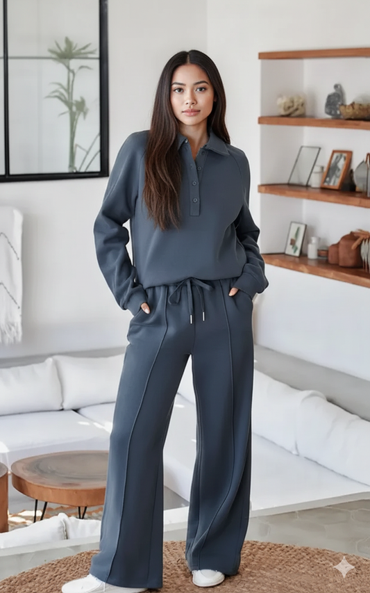 Woman wearing a gray outfit in a modern living room