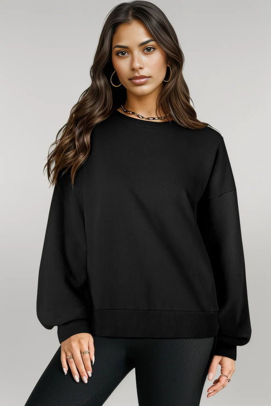 Black Solid O Neck High Low Hem Pullover Sweatshirt