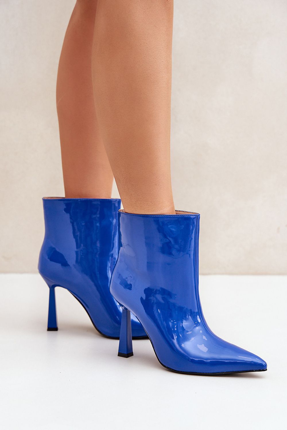 Step in style high-heeled patent ankle boots