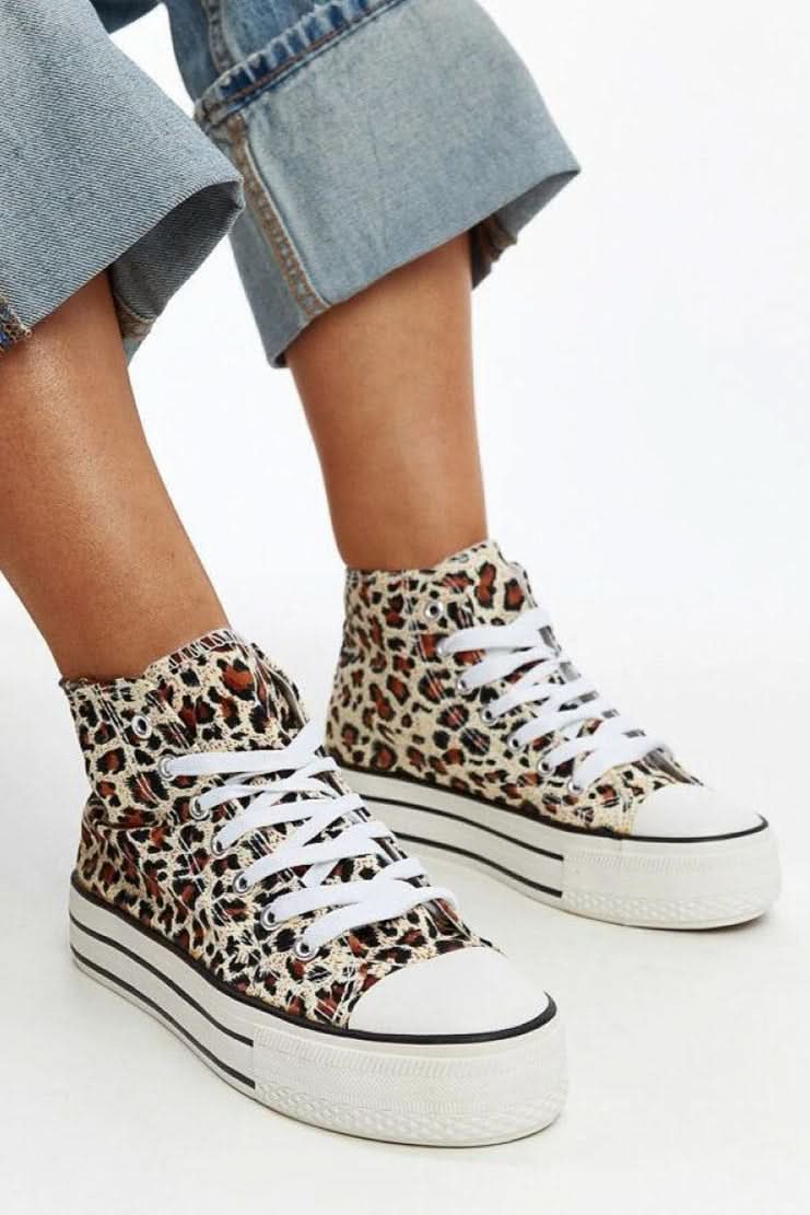 Orange High-top sneakers in leopard print with a thick sole sneakers